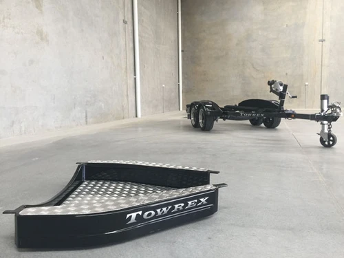 Towrex luggage box on a workshop floor beside a Towrex PWC trailer