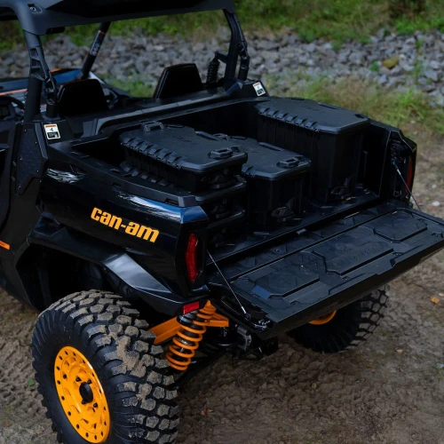 LinQ modular cargo boxes stacked in the tray of a Can-Am side-by-side