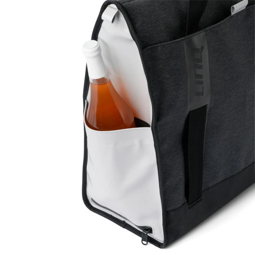 Side pocket of the LinQ insulated tote bag holding a drink bottle