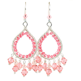Teardrop shaped sterling silver chandelier earrings with peach pink Austrian crystals handmade by Jessica Luu Jewelry