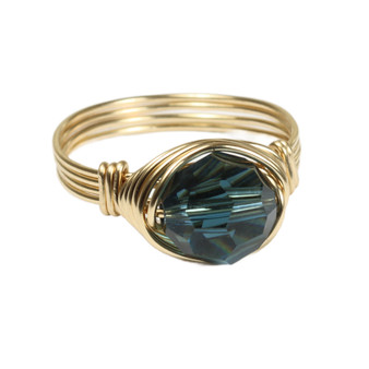 8mm montana sapphire blue colored Austrian crystal solitaire ring in 14K yellow gold filled wire wrapped setting handmade by Jessica Luu Jewelry