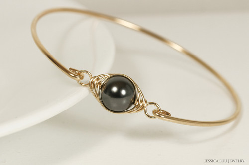 14K yellow gold filled wire wrapped bangle bracelet with black pearl handmade by Jessica Luu Jewelry