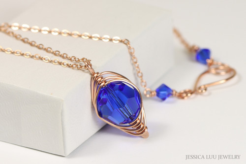 14K rose gold filled herringbone wire wrapped majestic cobalt blue crystal pendant on chain necklace handmade by Jessica Luu Jewelry