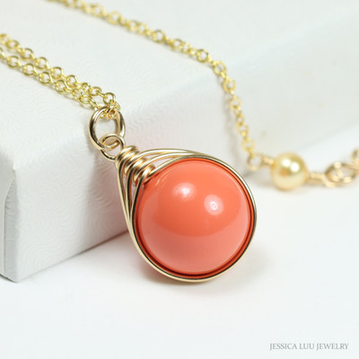 12mm orange coral pearl pendant in 14K yellow gold filled wire wrapped setting on 18 inch long chain necklace handmade by Jessica Luu Jewelry 12mm orange coral pearl pendant in 14K yellow gold filled wire wrapped setting on 18 inch long chain necklace handmade by Jessica Luu Jewelry