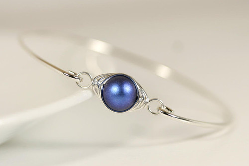 Sterling silver wire wrapped bangle bracelet with iridescent dark blue pearl handmade by Jessica Luu Jewelry