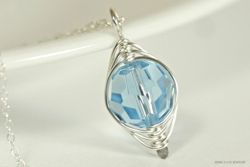 Sterling silver herringbone wire wrapped aquamarine blue crystal pendant on chain necklace handmade by Jessica Luu Jewelry