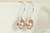 Sterling silver wire wrapped beige powder almond pearl drop earrings handmade by Jessica Luu Jewelry