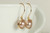14K yellow gold filled wire wrapped beige powder almond pearl drop earrings handmade by Jessica Luu Jewelry