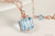 14K rose gold filled wire wrapped aquamarine blue crystal cube pendant on chain necklace handmade by Jessica Luu Jewelry