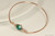 14k rose gold filled wire wrapped bangle bracelet with emerald green crystal handmade by Jessica Luu Jewelry