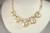 14k yellow gold filled wire wrapped statement bridal necklace with cream ivory flat coin pearls handmade by Jessica Luu Jewelry
