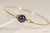 14K yellow gold filled wire wrapped bangle bracelet with dark purple pearl handmade by Jessica Luu Jewelry