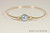 Handmade 14k yellow gold filled wire wrapped bangle bracelet with light blue pearl by Jessica Luu Jewelry