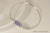 Sterling silver wire wrapped bangle bracelet with tanzanite crystal handmade by Jessica Luu Jewelry