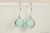 Sterling silver wire wrapped drop earrings with mint green alabaster crystals handmade by Jessica Luu Jewelry