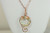 14K rose gold filled wire wrapped luminous iridescent clear light green crystal circle pendant on chain necklace handmade by Jessica Luu Jewelry