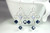 Sterling silver wire wrapped dark indigo blue crystal chandelier earrings handmade by Jessica Luu Jewelry