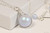 Sterling silver wire wrapped iridescent light dreamy blue pearl solitaire pendant on chain necklace handmade by Jessica Luu Jewelry