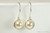 Sterling silver wire wrapped ivory cream pearl drop earrings handmade by Jessica Luu Jewelry