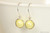 Sterling silver wire wrapped pastel light yellow pearl drop earrings handmade by Jessica Luu Jewelry