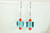 Sterling silver dangle earrings with aqua and orange crystals handmade by Jessica Luu Jewelry