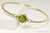 14k yellow gold filled wire wrapped bangle bracelet with olive green crystal handmade by Jessica Luu Jewelry