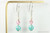 Sterling silver wire wrapped dangle earrings with light rose crystals and iridescent light turquoise pearls handmade by Jessica Luu Jewelry