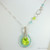 Sterling silver wire wrapped pendant with tiny aqua blue green crystals and large chartreuse dangle on chain necklace handmade by Jessica Luu Jewelry