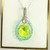 Sterling silver wire wrapped pendant with tiny aqua blue green crystals and large chartreuse dangle on chain necklace handmade by Jessica Luu Jewelry