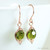 8mm faceted round olive green crystal dangle earrings in 14K rose gold filled wire wrapped setting handmade by Jessica Luu Jewelry 8mm faceted round olive green crystal dangle earrings in 14K rose gold filled wire wrapped setting handmade by Jessica Luu Jewelry