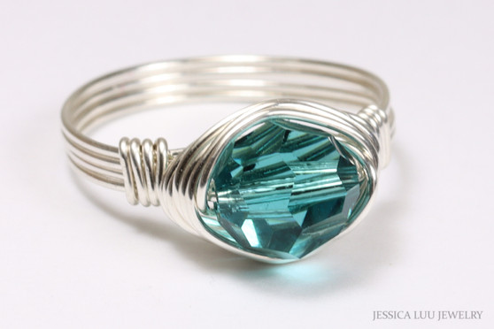 Sterling silver wire wrapped teal blue indicolite crystal solitaire ring handmade by Jessica Luu Jewelry