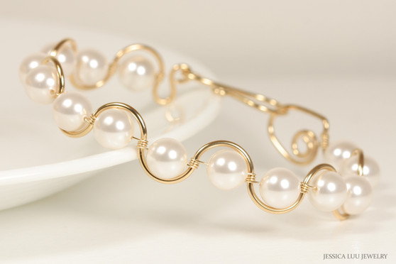 14k yellow gold filled wire wrapped bracelet with white pearls handmade by Jessica Luu Jewelry