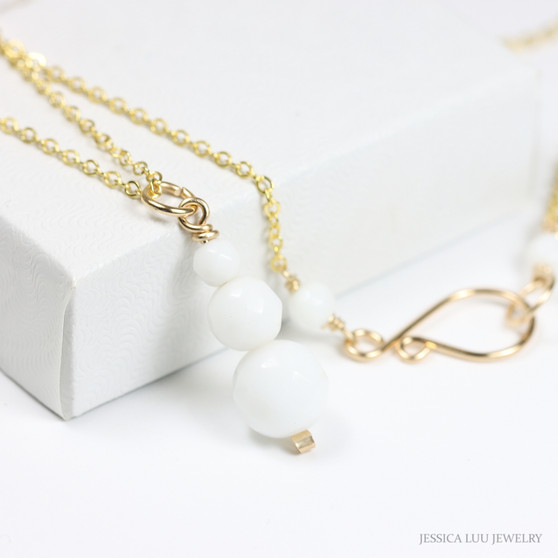White alabaster gemstone pendant on 14K yellow gold filled chain necklace handmade by Jessica Luu Jewelry