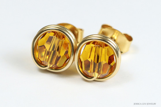 14K yellow gold filled wire wrapped orange topaz crystal round stud earrings handmade by Jessica Luu Jewelry