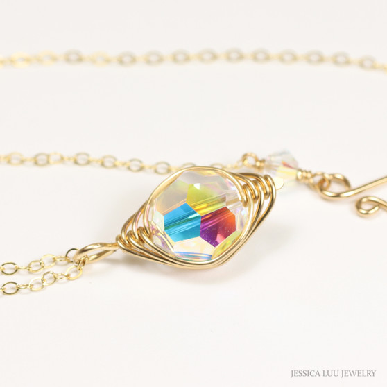 14K yellow gold filled chain necklace with 10mm iridescent clear Austrian crystal solitaire pendant handmade by Jessica Luu Jewelry