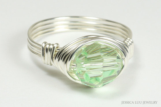 Sterling silver wire wrapped light green chrysolite crystal solitaire ring handmade by Jessica Luu Jewelry