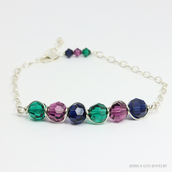 Sterling silver wire wrapped chain bracelet with green purple blue crystals handmade by Jessica Luu Jewelry