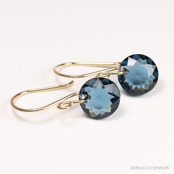 14K yellow gold filled dangle earrings with Montana blue sapphire faceted crystal drops handmade by Jessica Luu Jewelry