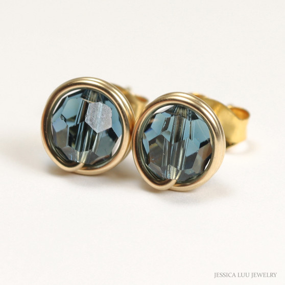 6mm Montana sapphire blue Austrian crystal stud earrings in 14K yellow gold filled wire wrapped setting handmade by Jessica Luu Jewelry
