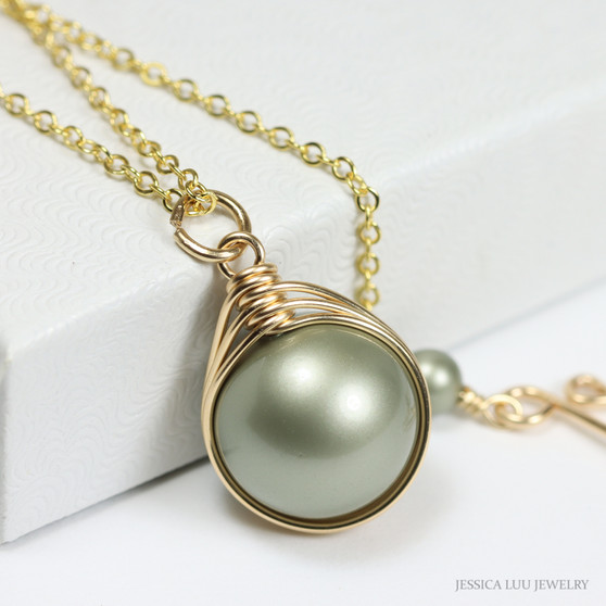 12mm sage green pearl solitaire in 14K yellow gold filled wire wrapped setting on 18 inch long chain necklace handmade by Jessica Luu Jewelry