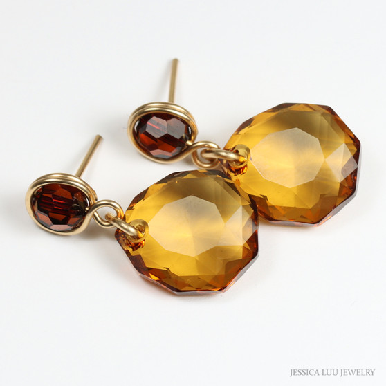 Golden brown Austrian crystal dangle earrings with dark brown Austrian crystal post backings handmade by Jessica Luu Jewelry
