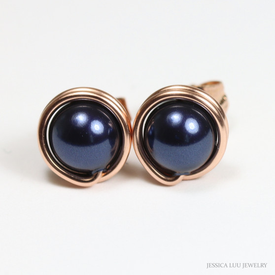 6mm navy blue pearl stud earrings in 14K rose gold filled wire wrapped setting handmade by Jessica Luu Jewelry