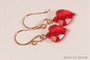14K rose gold filled earrings with light siam red crystal heart dangles handmade by Jessica Luu Jewelry