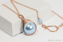 14k rose gold filled wire wrapped light blue pearl solitaire pendant on chain necklace handmade by Jessica Luu Jewelry