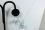 Sterling silver wire wrapped light blue pearl drop earrings and necklace set handmade by Jessica Luu Jewelry