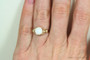 8mm faceted round white alabaster gemstone solitaire ring in 14K yellow gold filled wire wrapped setting and band handmade by Jessica Luu Jewelry