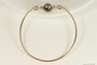 14K yellow gold filled wire wrapped bangle bracelet with black pearl handmade by Jessica Luu Jewelry