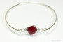 Sterling silver wire wrapped bangle bracelet with garnet red siam crystal handmade by Jessica Luu Jewelry