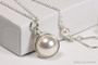 Sterling silver wire wrapped white pearl solitaire pendant on chain necklace handmade by Jessica Luu Jewelry