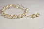 14k yellow gold filled wire wrapped bracelet and earrings set with cream pearls handmade by Jessica Luu Jewelry